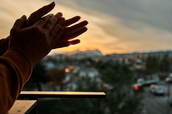 Image of someone clapping